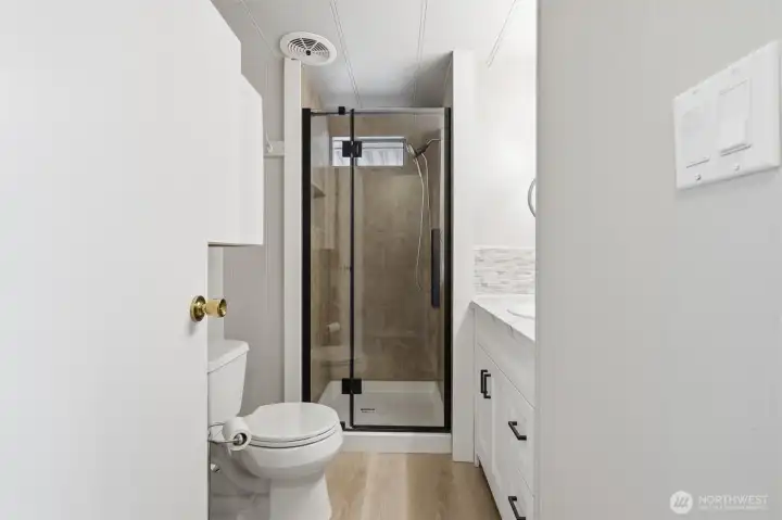 3/4 bath with new vanity and shower