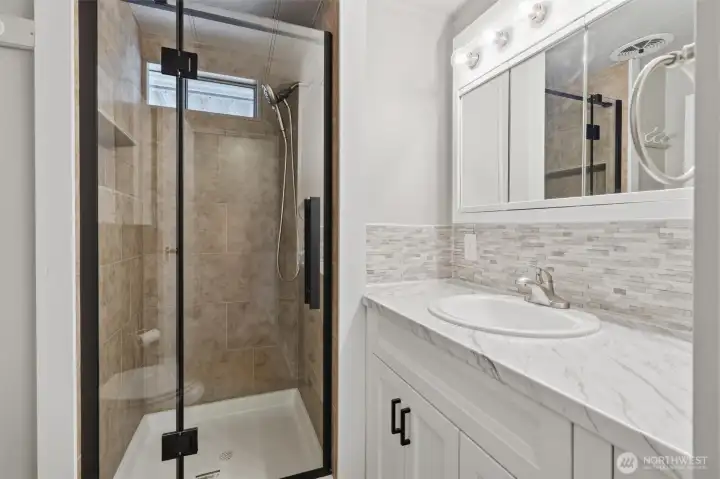 3/4 bath with new vanity and shower