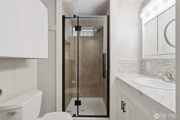 3/4 bath with new vanity and shower