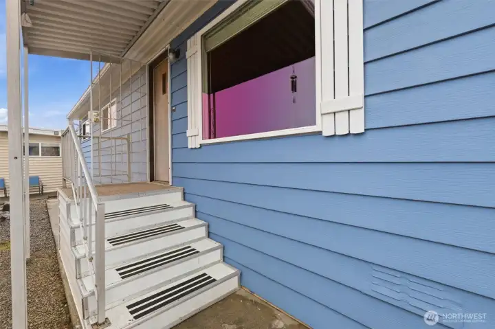 primary entrance to home from carport