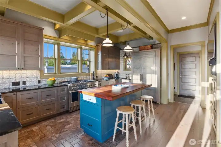 The kitchen is often the heart of a home, and this inviting space lives up to that reputation. Thoughtfully designed for both function and connection, it allows guests to gather comfortably, relax, and converse while the chef prepares meals—making it perfect for everyday living as well as effortless entertaining.