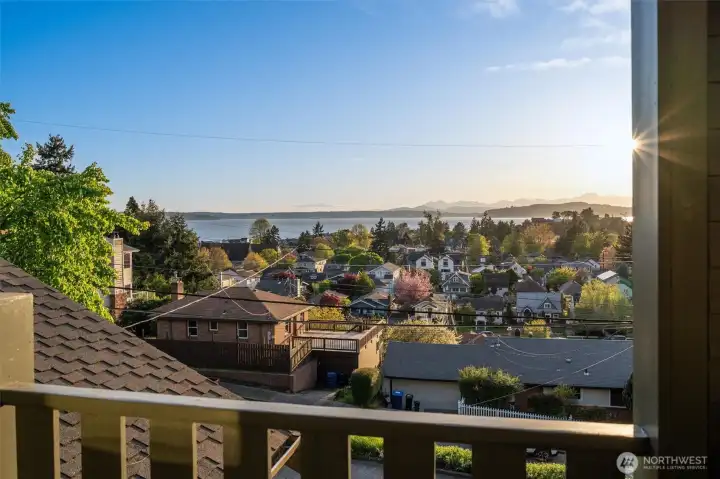 From the private covered deck off the primary suite, enjoy a stunning west-facing view toward the Olympic Mountains. This peaceful outdoor retreat offers a front-row seat to breathtaking sunsets, shifting skies, and the natural beauty of the surrounding landscape, all in a quiet and sheltered setting.