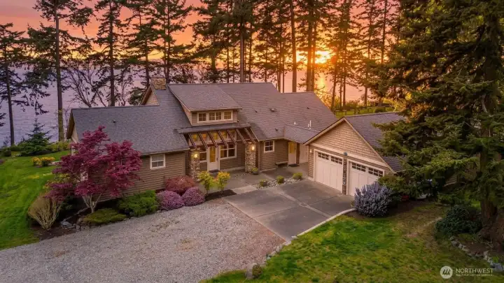 Sunset Views from 725 N Sunset Drive. 2,103sqft home, 3-bedroom 2.5-bath home with 3 outbuildings on 3.23 acres on the North end of Camano Island.