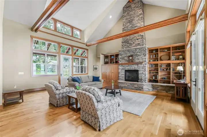 This beautifully designed home is complete with vaulted ceilings, a stone gas fireplace and hardwood floors.