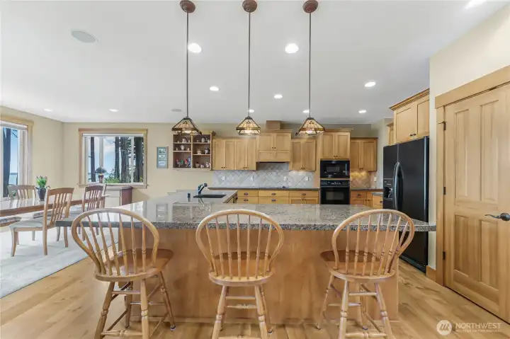 The kitchen is open to the dining room and has access to the deck.  An entertainer's dream!