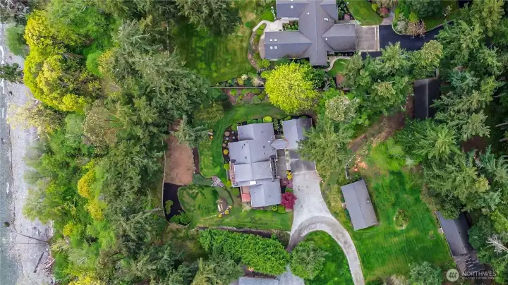 3.23 acres with 140 feet of waterfront, a beautiful home and 3 outbuildings all on the convenient north end of Camano Island.