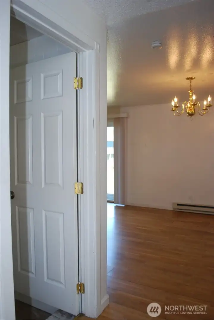 View from the front entry looking into the eat-in kitchen and the doorway to the spacious family room. View from the front entry looking into the eat-in kitchen and the doorway to the spacious family room.