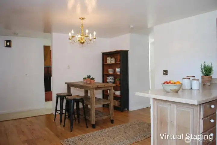 Virtually staged eat-in kitchen with glass slider leading to patio out back. View from the glass slider leading to the Kitchen from the backyard. Virtually staged eat-in kitchen with glass slider leading to patio out back. View from the glass slider leading to the Kitchen from the backyard.