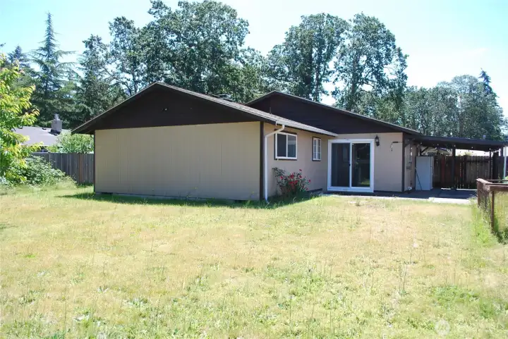 Big covered patio, large fenced backyard, and shed. The yard has plenty of room for a garden and RV parking. Located in a quiet neighborhood. Big covered patio, large fenced backyard, and shed. The yard has plenty of room for a garden and RV parking. Located in a quiet neighborhood.