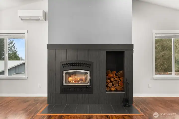 Fireplace has built-in heat ducting system Fireplace has built-in heat ducting system