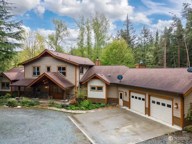 The home has great curb appeal, with an attached oversized 3 vehicle garage and a separate shop.