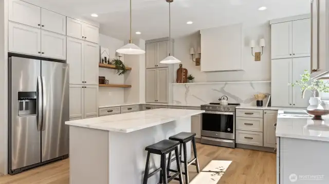 Island in Kitchen offers additional eating and cabinet space.