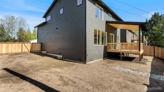 This property is on the corner and the big yard is fully fenced.