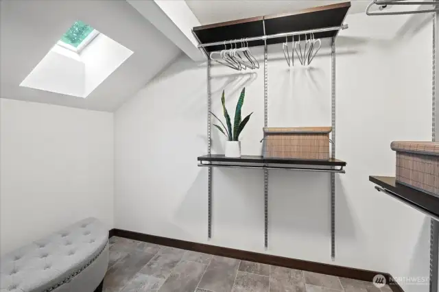 Primary walk-in closet with customer organizers
