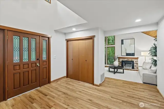 Step inside to appreciate the two story entry, hardwood floors and stunning NW architecuture throughout this custom home.