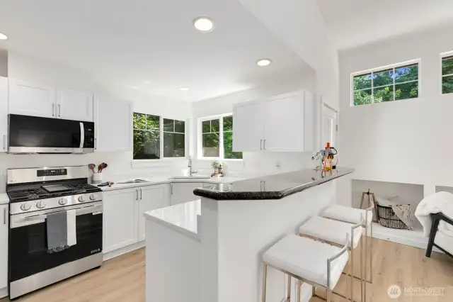 Brand new appliances, countertops, sink, hardware & painted cabinets