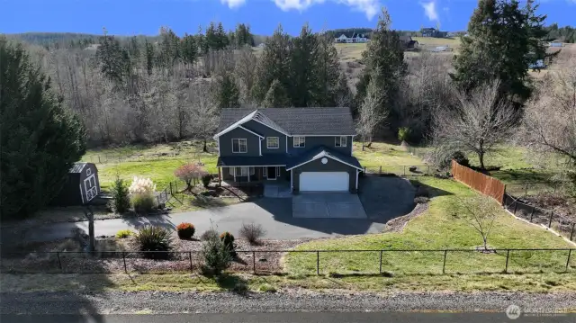 This private, 1+ acre property is designed for entertaining a crowd. With a beautiful lake and spectacular territorial views, there's plenty of room for hosting a party or just enjoying the scenery.