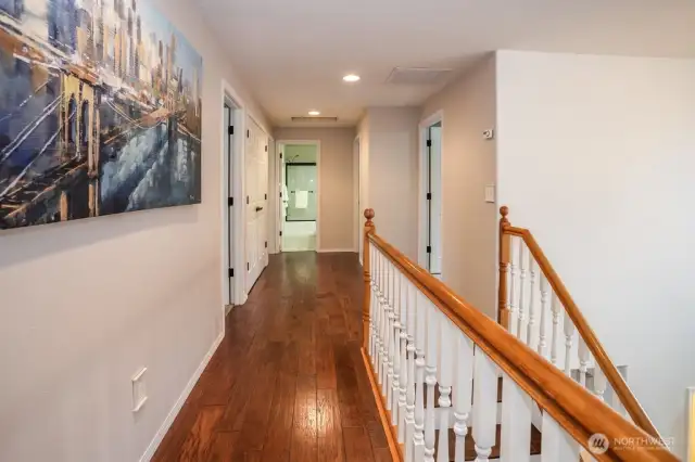 Upon reaching the top of the staircase you will encounter an open hallway. At the end of the hallway you will find a conveniently located full guest bathroom, centrally located between the 3 guest bedrooms.