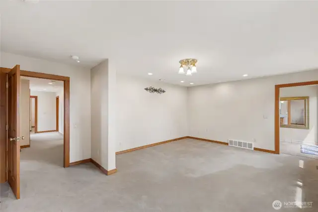 Primary bedroom with privacy wall.