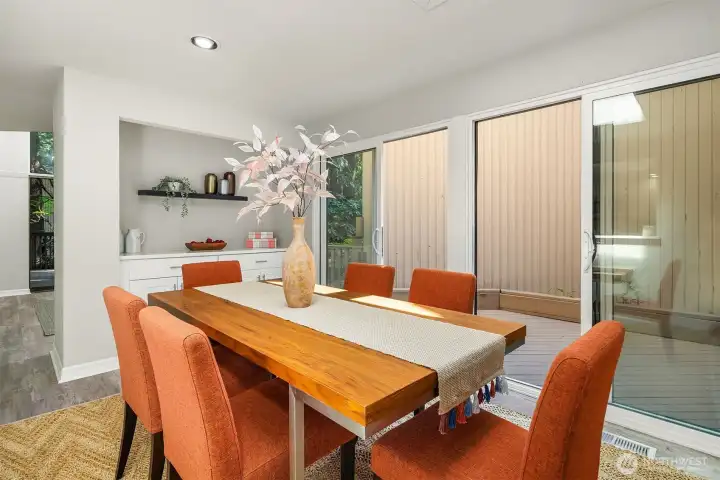 Kitchen eating / dining area features a coffee bar area with additional cabinetry.