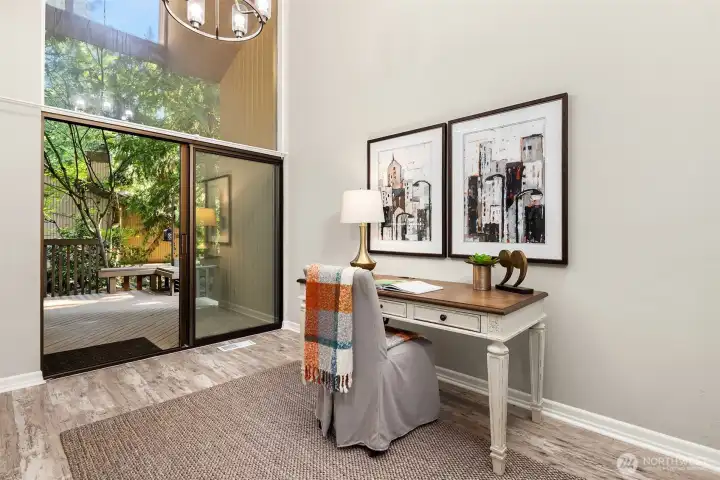 Formal dining area, currently staged as an office.