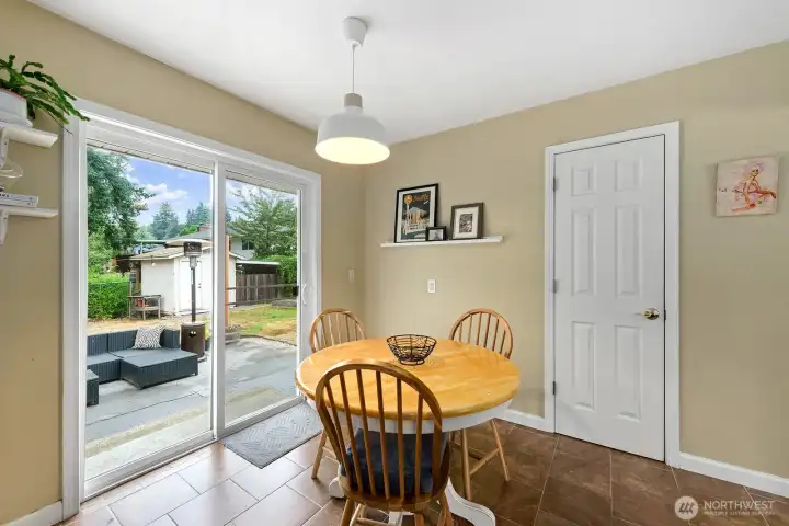 the dining room is large enough for a big table and has sliders to the deck.