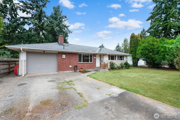 The garage has lofted storage and is extra long.