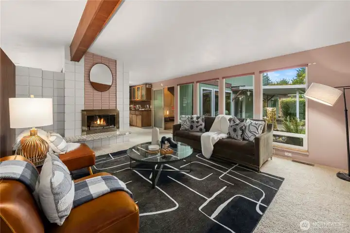 Fall in love instantly with the vaulted ceilings and huge picture windows overlooking the backyard zen garden