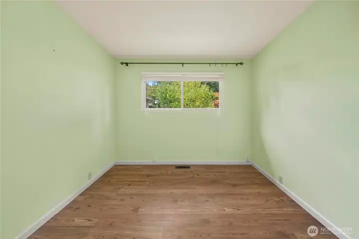One of 3 bedrooms on the main level.