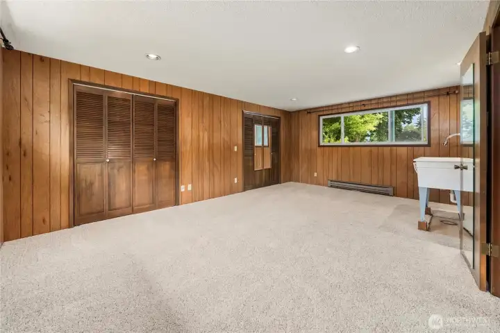 Upstairs secondary primary bedroom was previously used as an art studio, so many possibilities of what you can do with this huge room that has its own entrance and attached 3/4 bath!