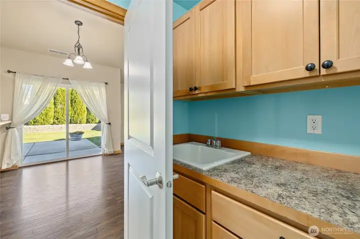 Laundry room with sink, folding counter + more storage!