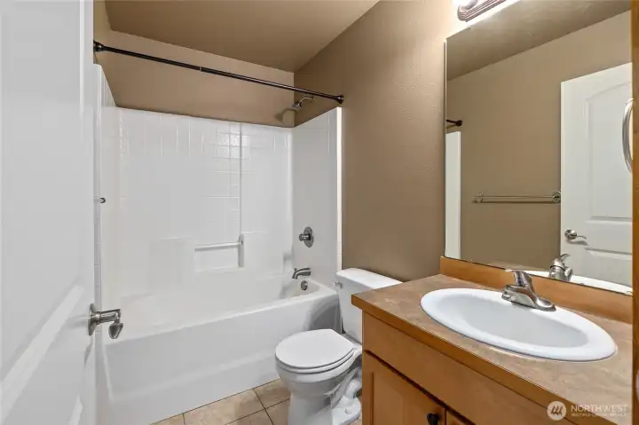 Full bathroom for guests and bedrooms two & three.