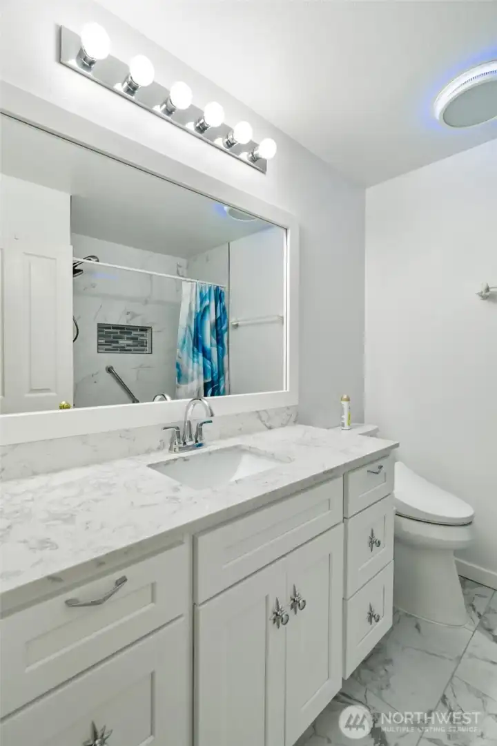 Upper level guest bath has been completely remodeled