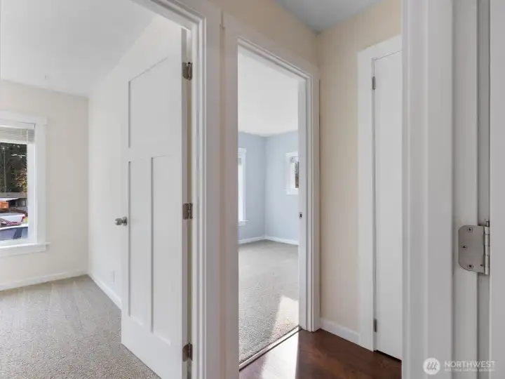 hall to the main bathroom and 2 bedrooms.