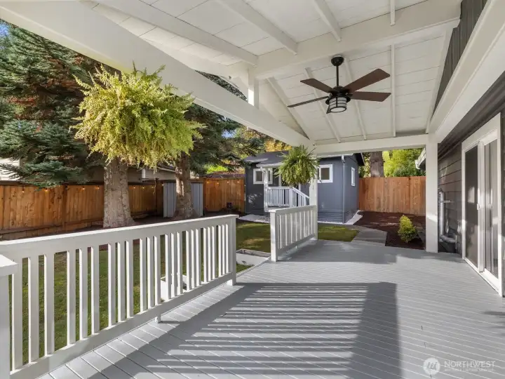 Expansive deck that leads to the spacious fully fenced yard.