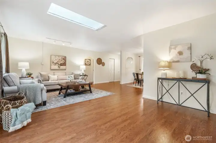 These floors are gorgeous! Beautiful laminate flooring elevates the main living area. The skylight brings in natural light even on cloudy PNW days!