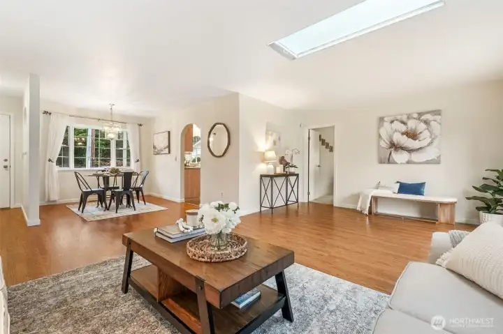 Spacious living room flows seamlessly into dining—perfect for entertaining.