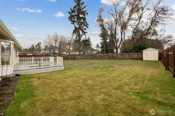 Enjoy an expansive, fully fenced backyard complete with an entertainment-ready deck and a versatile 8x8 shed. This generous outdoor space is ideal for summer barbecues, gardening, or simply unwinding in your own personal retreat.