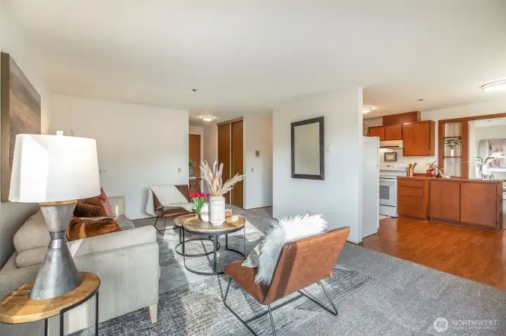 Spacious living room & open kitchen with big windows, lots of natural light. Freshly painted & new carpet throughout.