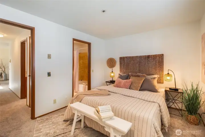 Primary bedroom with ensuite bath.