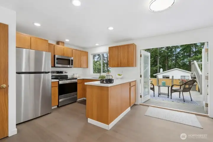 Updated Kitchen with quartz countertop and SS appliance