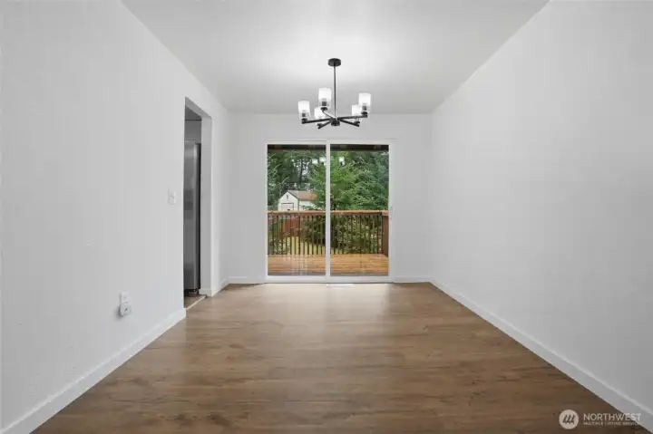 Dining area with sliding door to deck