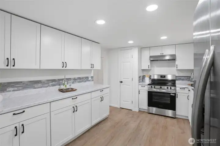 Updated kitchen with brand new stainless steel appliance package