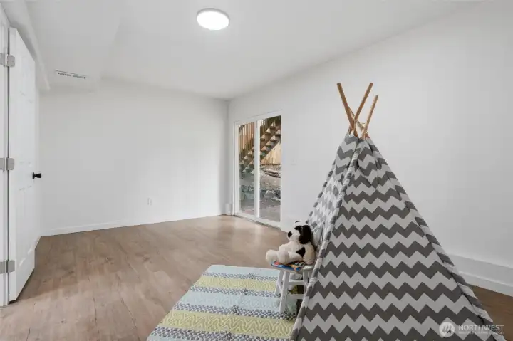 Bonus room downstairs with slider to backyard