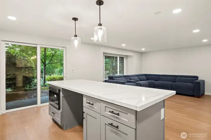 Functional open-floor plan with easy access to the outdoors.