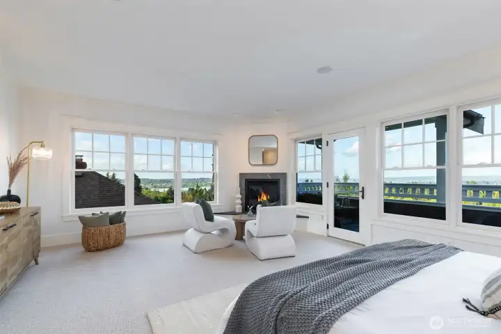 The primary suite is on the northeast corner of the house, and has the best views of all.