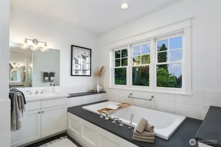 Separate vanities provide tons of storage.