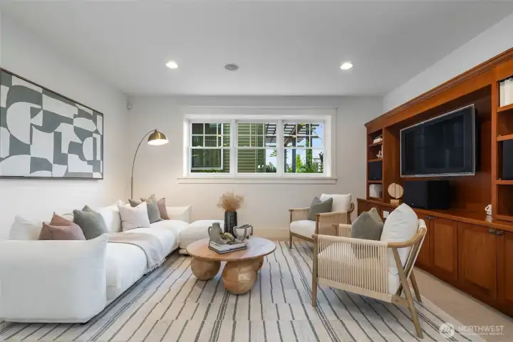 This is the downstairs media room and flex space.