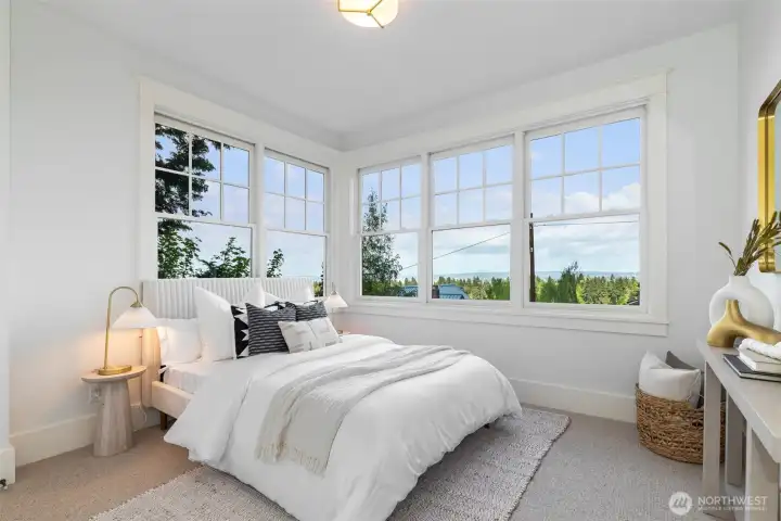 This guest room lives on the first level, as well as a full bathroom.