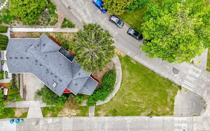 Bird's-eye view highlighting the spacious footprint, refreshed landscaping, and well-maintained roofline.